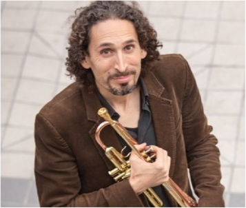 Picture of John Daversa holding a trumpet